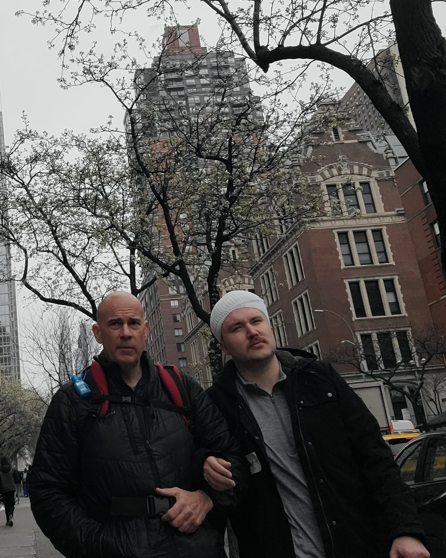 Caleb out in New York during recovery—walking the city after the device was turned on.